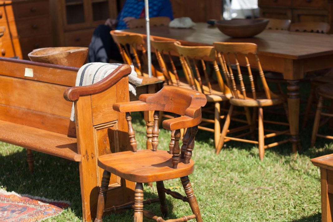 Old furniture for sale at a flea market